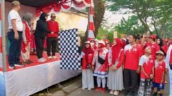 Wabup Intan Lepas Gerak Jalan HUT RI Warga Graha Lestari